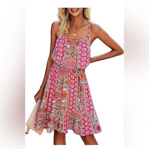 Spaghetti dress with adjustable straps and a belt.